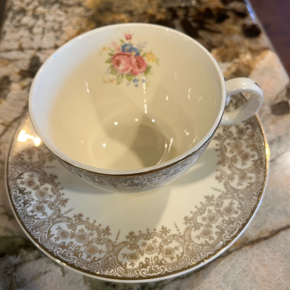 vintage Tea Cup and Saucer. dainty with roses made in USA